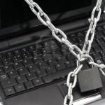 4574528-laptop-keyboard-secured-with-chain-and-padlock